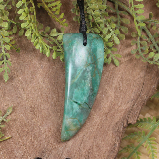Tooth pendant carved from Fuchsite
