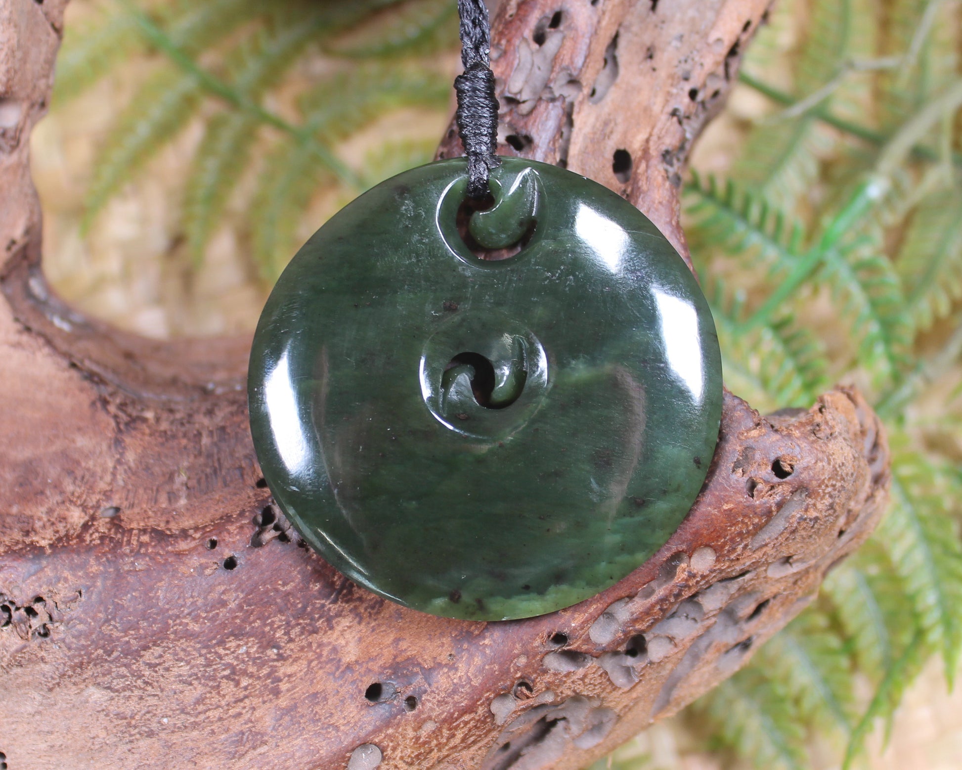 Koru carved from Rimu Pounamu - NZ Greenstone
