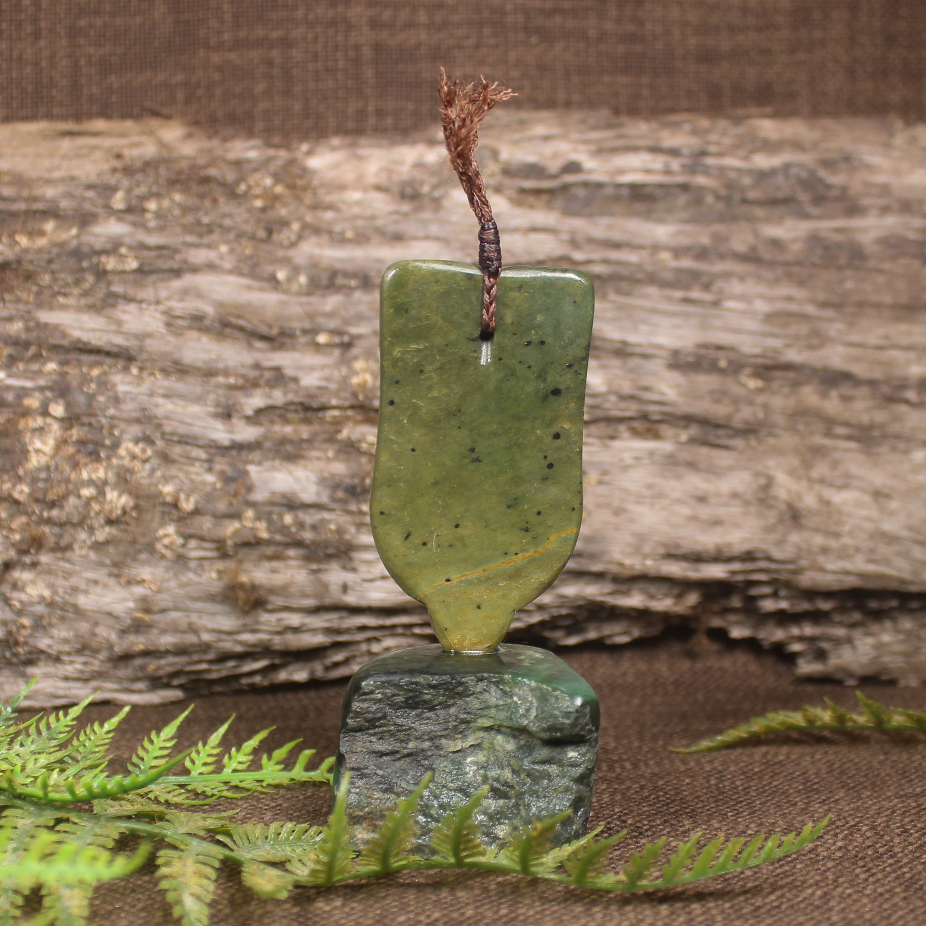 Tekoteko head sculpture carved from Flower Jade Pounamu - NZ Greenstone