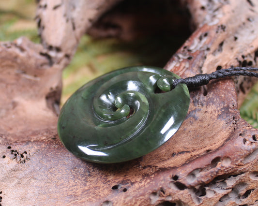 Koru carved from Rimu Pounamu - NZ Greenstone