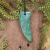 Tooth pendant carved from Fuchsite
