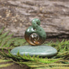Flower Jade Pounamu Koru Twist set on a Pounamu base - NZ Greenstone