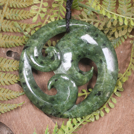 Koru pendant carved from Rimu Pounamu - NZ Greenstone