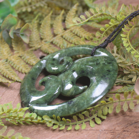 Koru pendant carved from Rimu Pounamu - NZ Greenstone