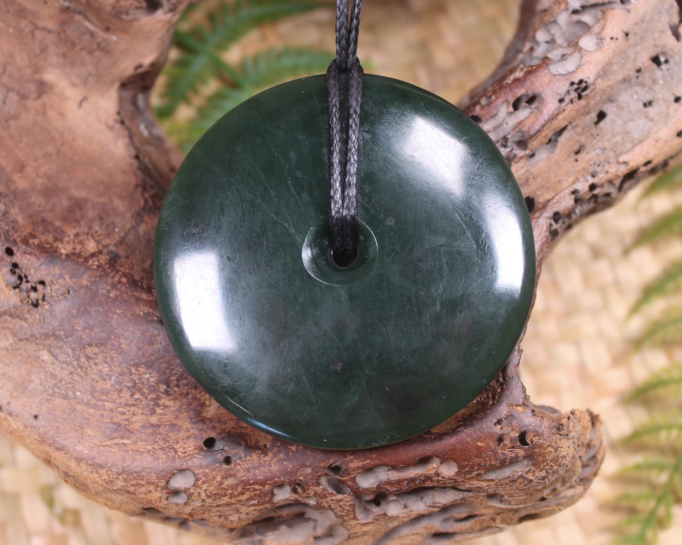 Porowhita or Pi Stone carved from Kawakawa Pounamu - NZ Greenstone