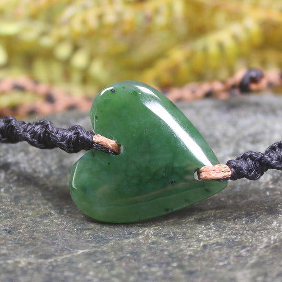 Adjustable cord bracelet with Hapopo Pounamu