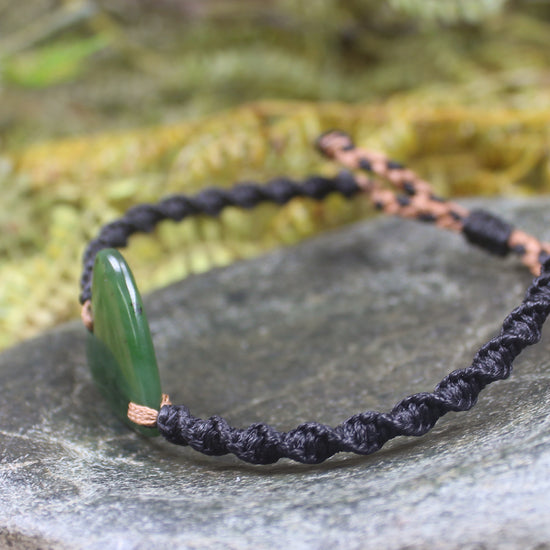 Adjustable cord bracelet with Hapopo Pounamu