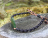 Adjustable cord bracelet with Hapopo Pounamu