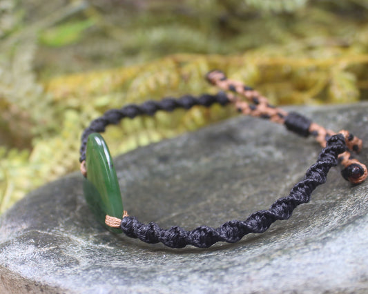 Adjustable cord bracelet with Hapopo Pounamu