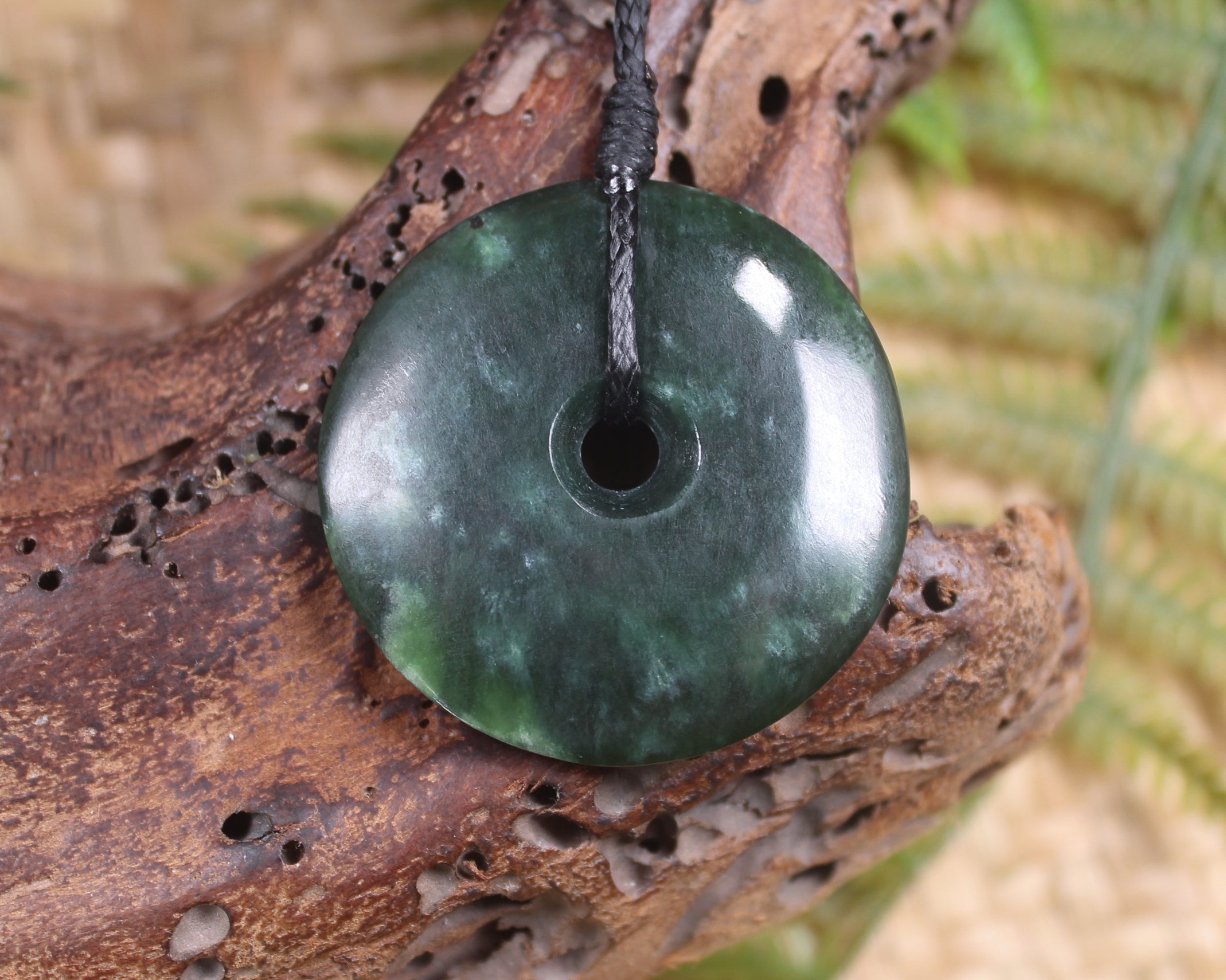 Porowhita or Pi Stone carved from Kawakawa Pounamu - NZ Greenstone