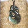 Flower Jade Pounamu Manaia pendant that has been framed - NZ Greenstone
