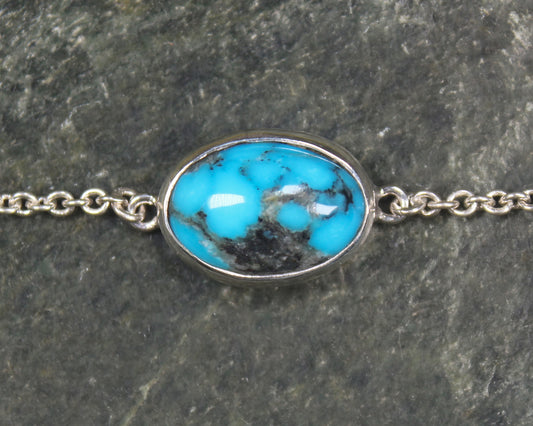 Turquoise set in a Sterling Silver chain bracelet