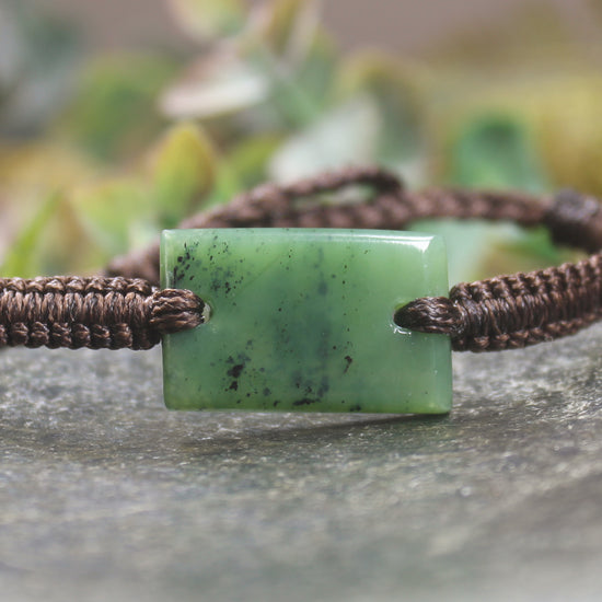 Adjustable cord bracelet with Hapopo Pounamu