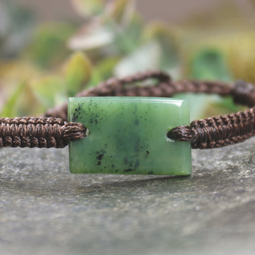 Adjustable cord bracelet with Hapopo Pounamu