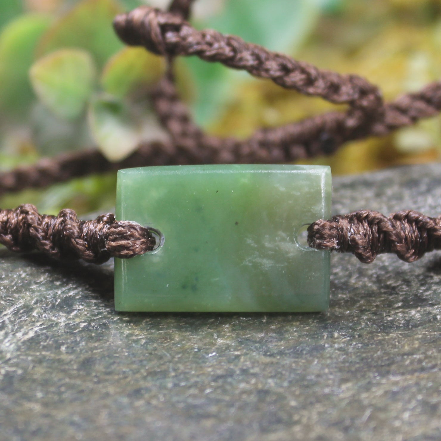 Adjustable cord bracelet with Hapopo Pounamu