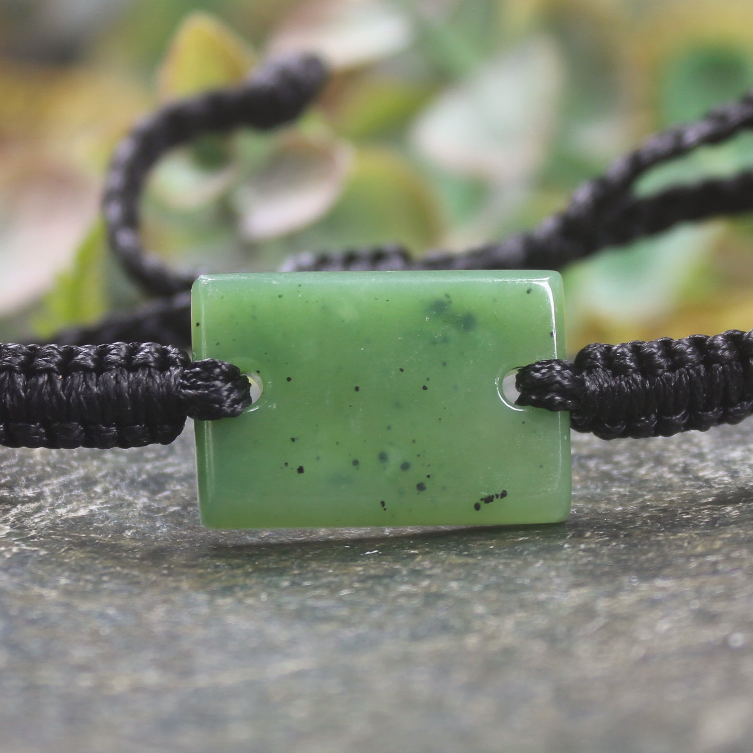 Adjustable cord bracelet with Hapopo Pounamu