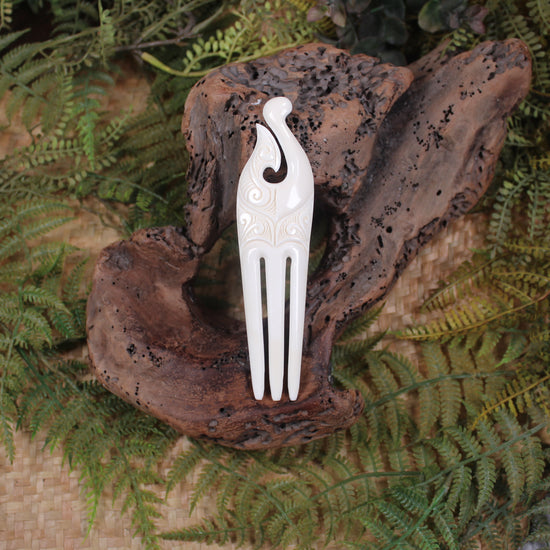 Heru with Matau carved from beef bone