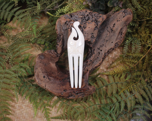 Heru with Matau carved from beef bone