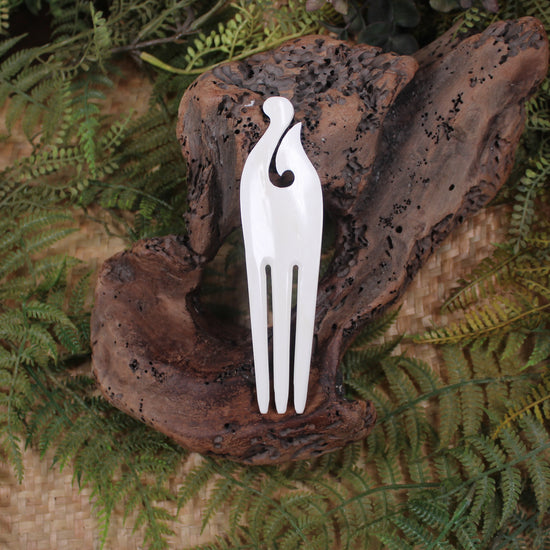 Heru with Matau carved from beef bone