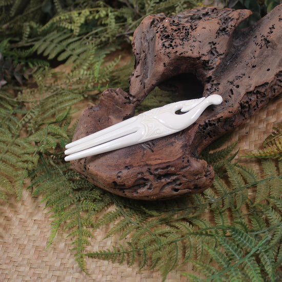 Heru with Matau carved from beef bone