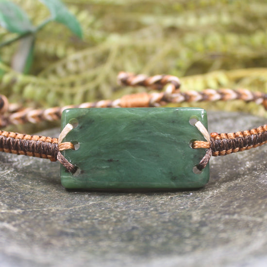 Adjustable cord bracelet with Hapopo Pounamu