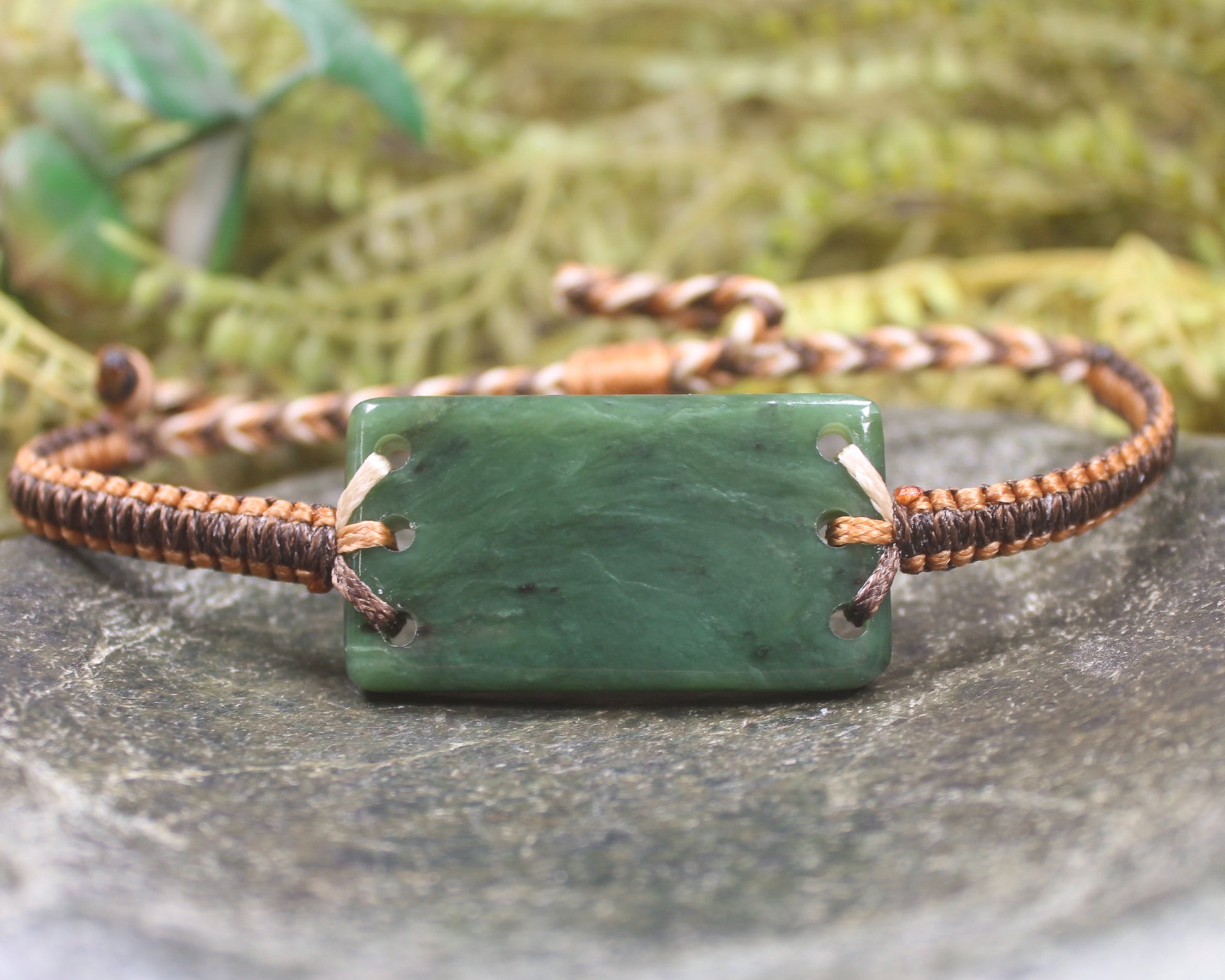 Adjustable cord bracelet with Hapopo Pounamu