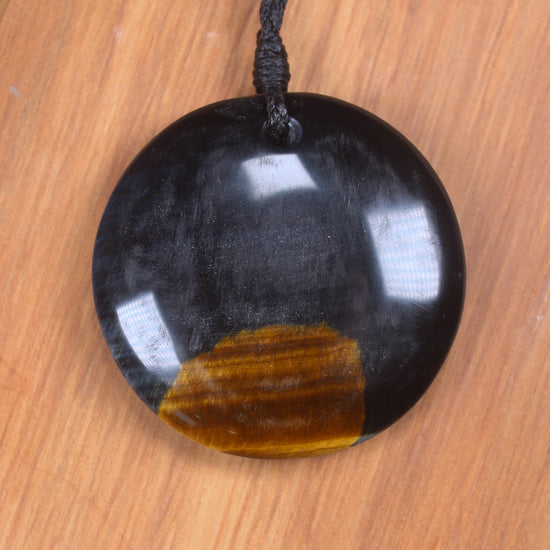 Porowhita carved from Blue Tigers Eye