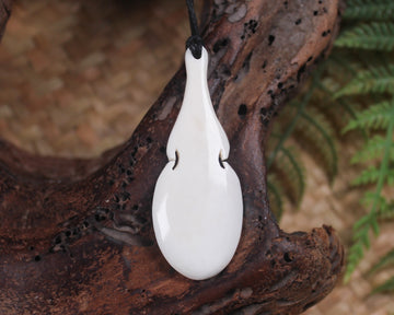 Bone Patu pendant