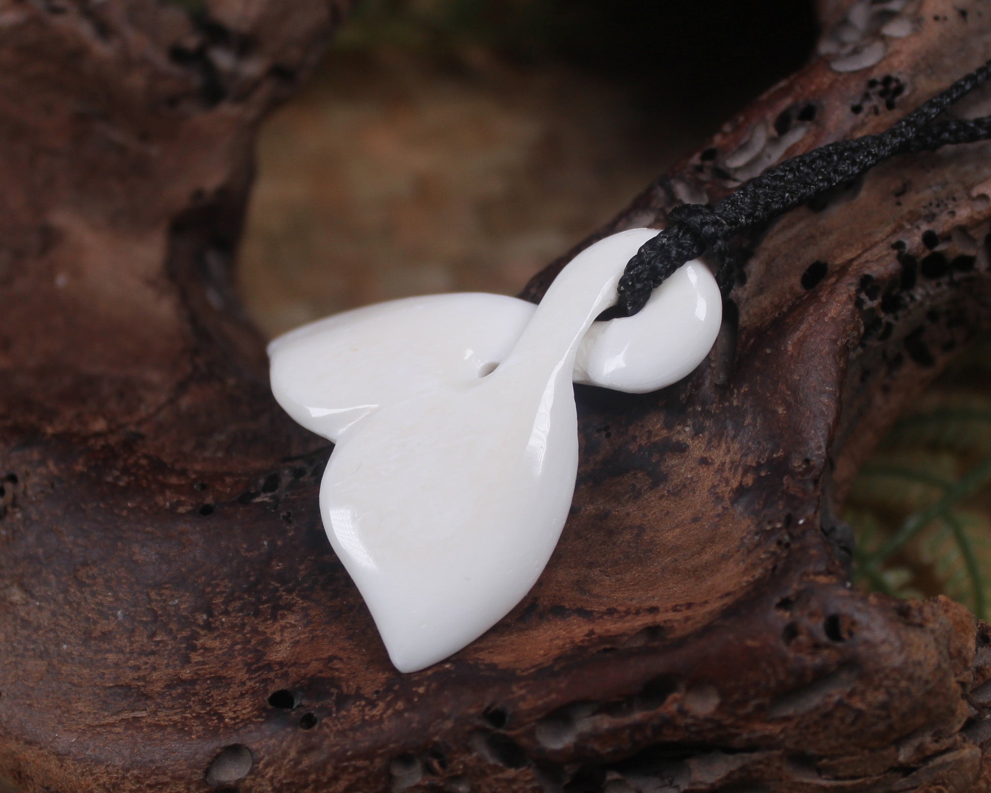 Whale tail carved from NZ Beef Bone