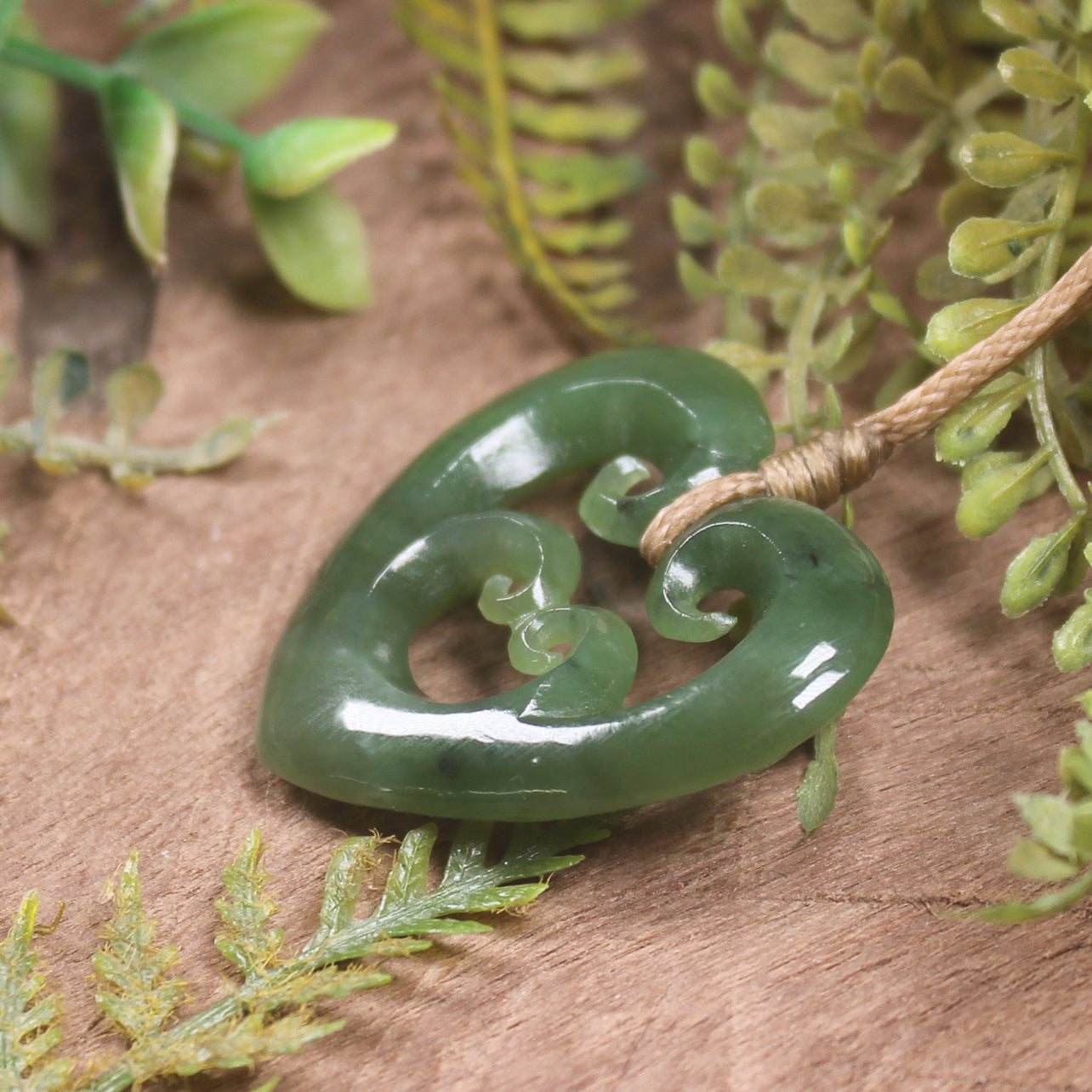 Heart with Koru carved from Hapopo Pounamu - NZ Greenstone