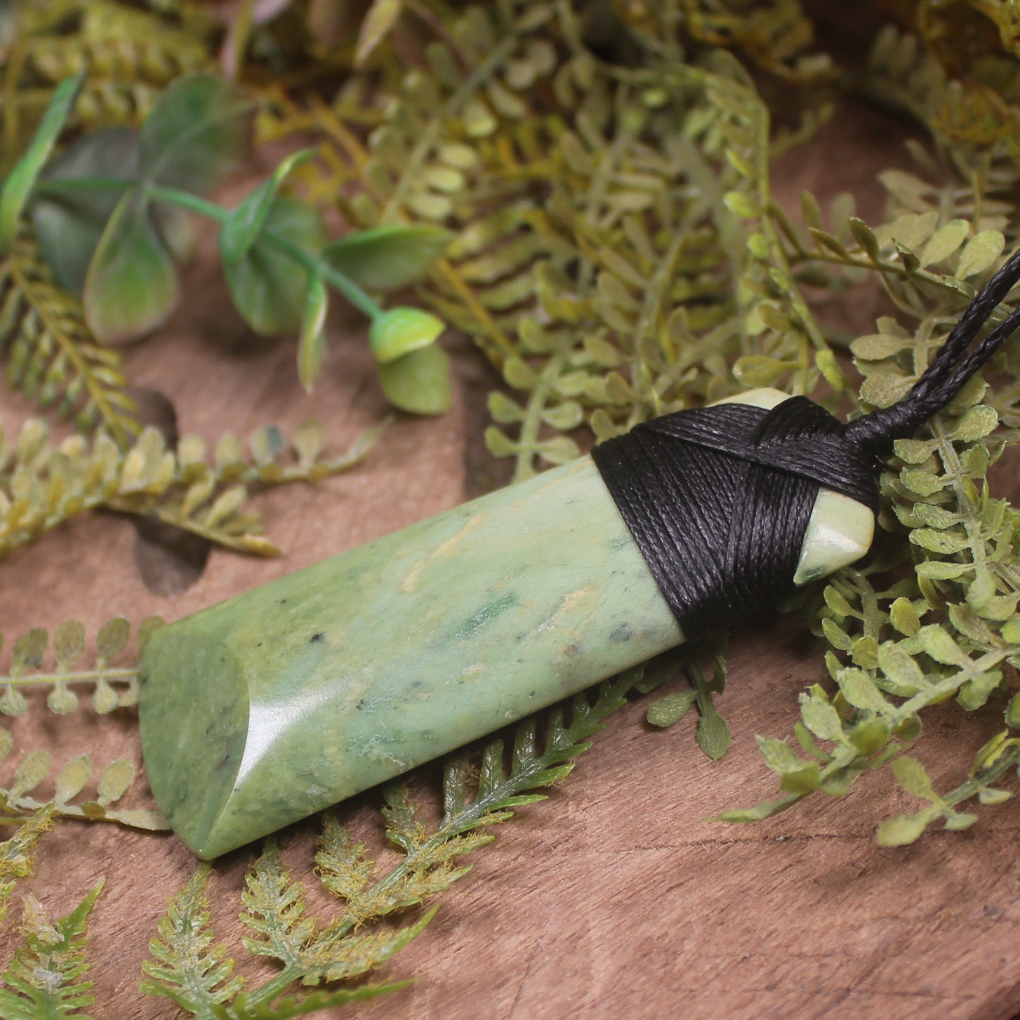 Flower Jade pounamu roimata and toki pendants - NZ Greenstone