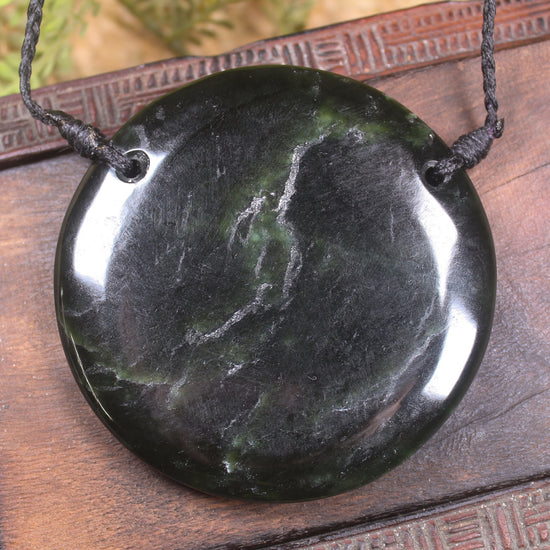 Porowhita or Pi Stone carved from Kawakawa Pounamu - NZ Greenstone