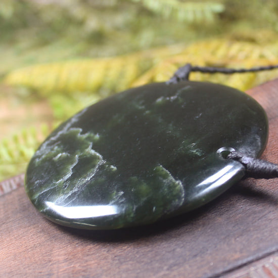 Porowhita or Pi Stone carved from Kawakawa Pounamu - NZ Greenstone