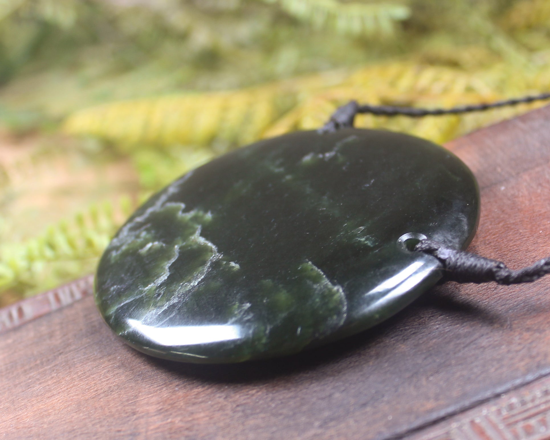 Porowhita or Pi Stone carved from Kawakawa Pounamu - NZ Greenstone