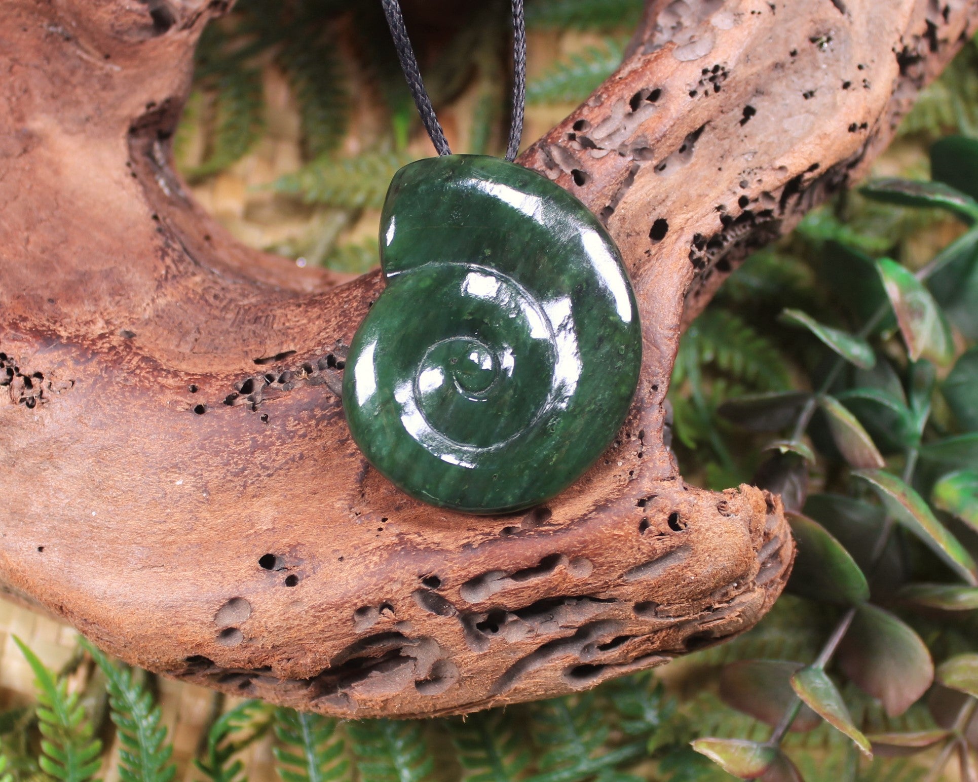 Koru pendant carved from Kawakawa Pounamu - NZ Greenstone