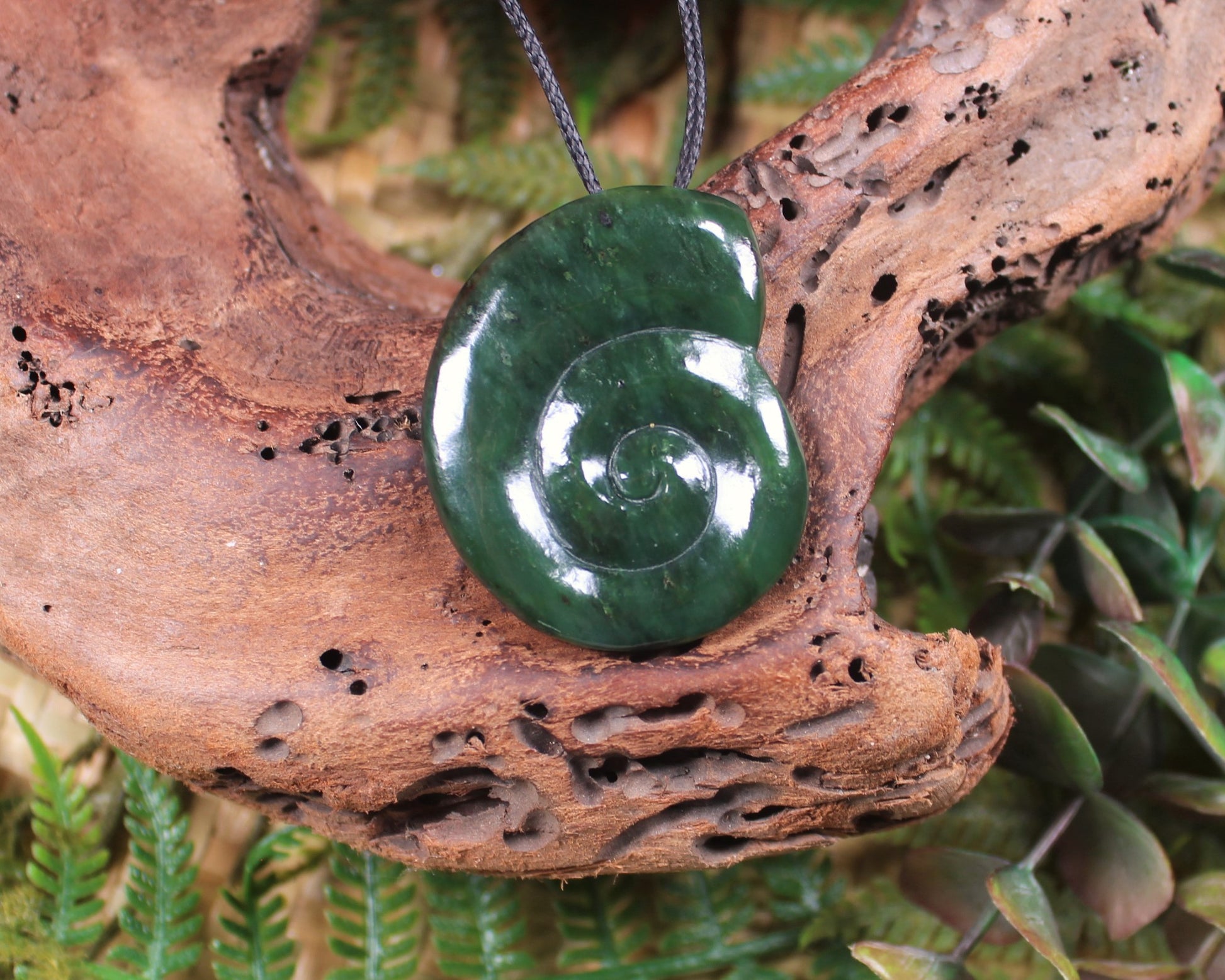Koru pendant carved from Kawakawa Pounamu - NZ Greenstone