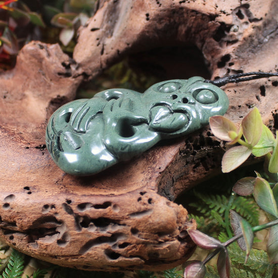 Hei Tiki carved from NZ Pakohe or Argillate