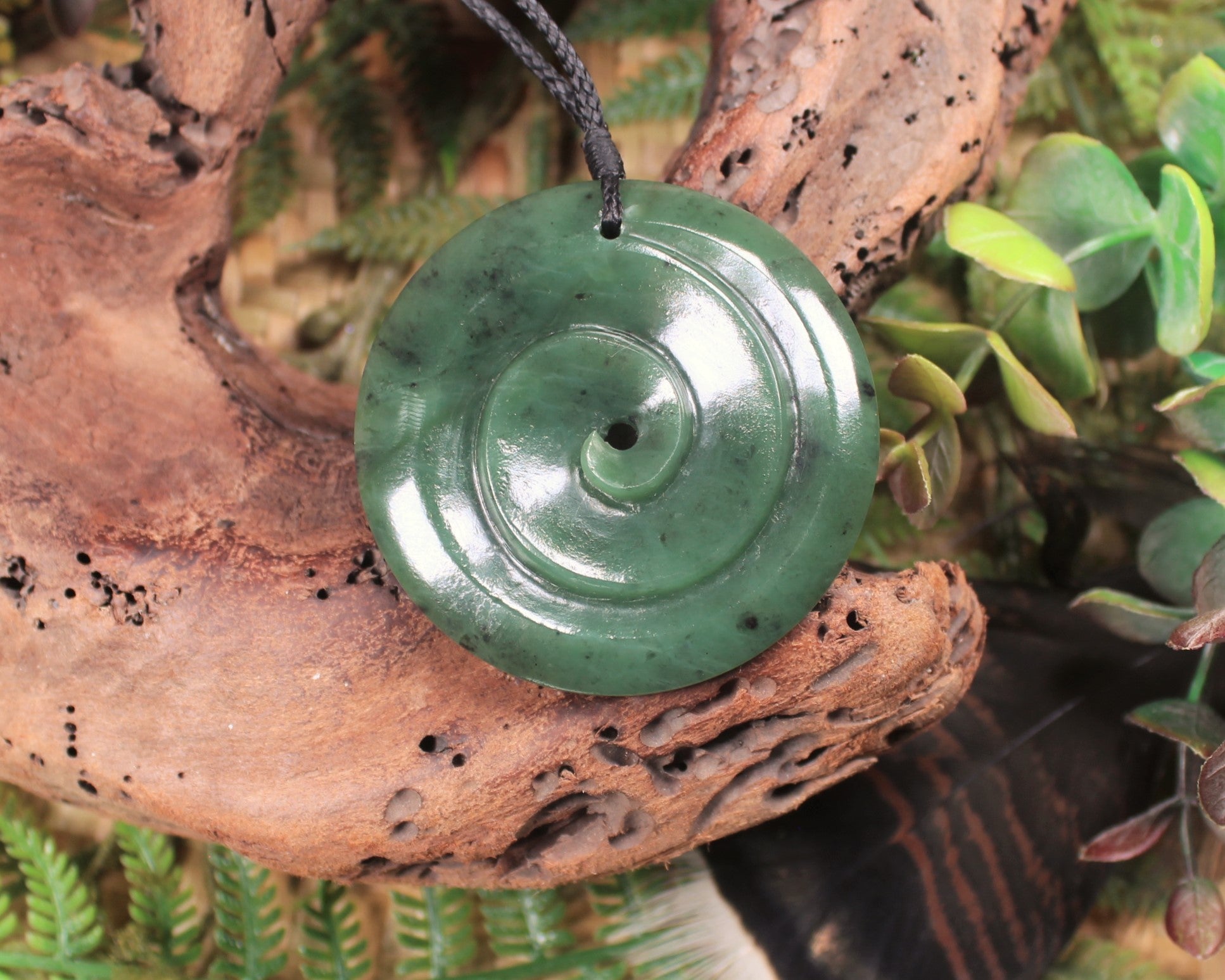 Koru carved from Hapopo Pounamu - NZ Greenstone