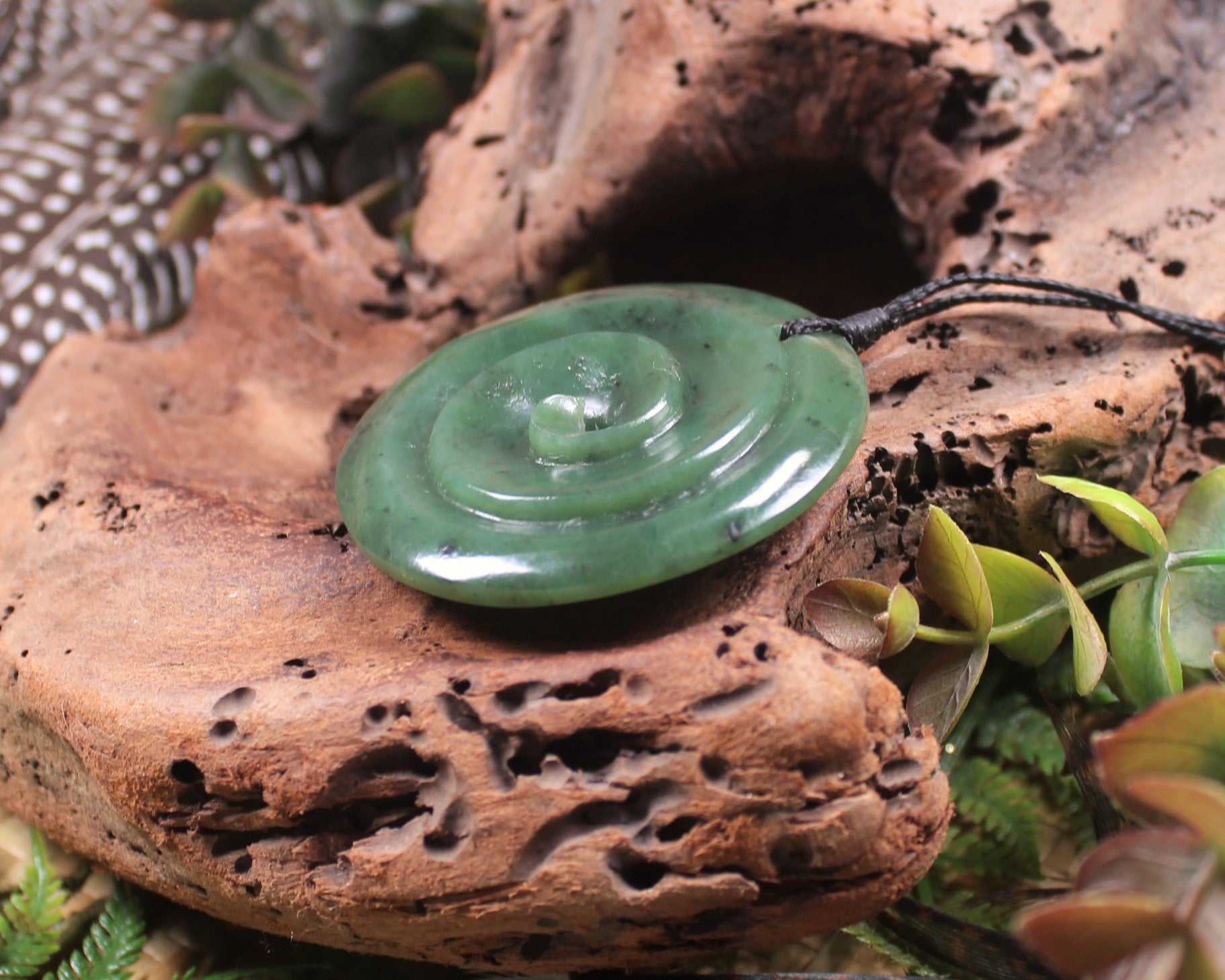 Koru carved from Hapopo Pounamu - NZ Greenstone