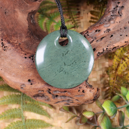 Porowhita or Pi Stone carved from NZ Pakohe or Argillite