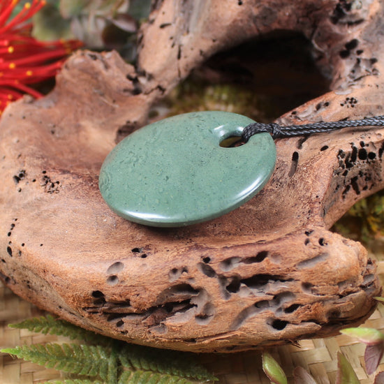 Porowhita or Pi Stone carved from NZ Pakohe or Argillite