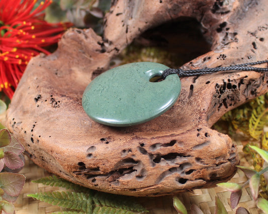 Porowhita or Pi Stone carved from NZ Pakohe or Argillite