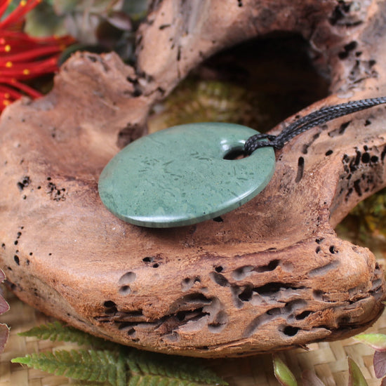 Porowhita or Pi Stone carved from NZ Pakohe or Argillite