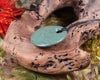 Porowhita or Pi Stone carved from NZ Pakohe or Argillite
