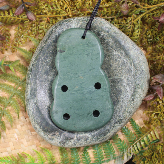 Hei Tiki carved from NZ Pakohe or Argillate