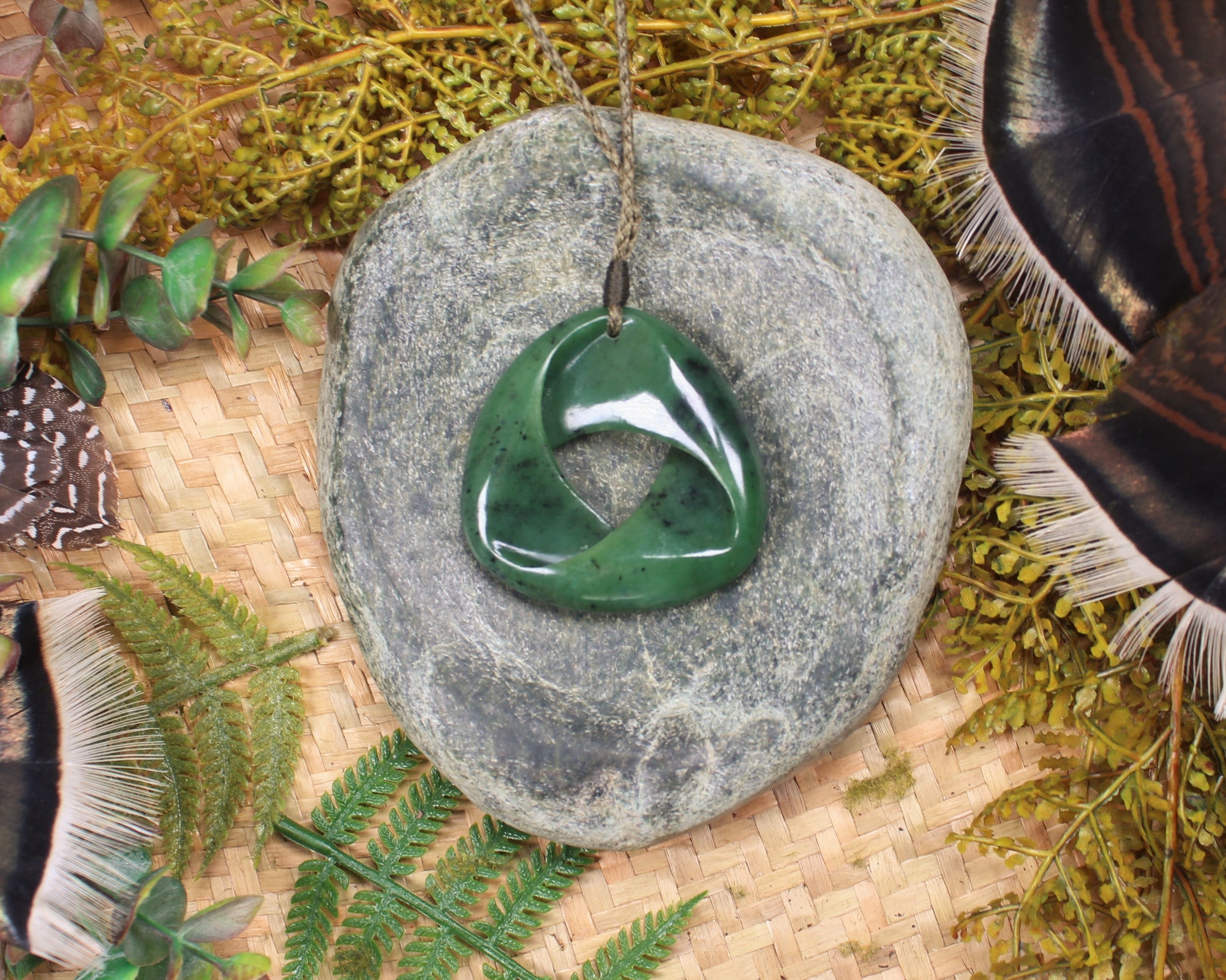 Mobius Ribbon Pendant carved from Hapopo Pounamu - NZ Greenstone