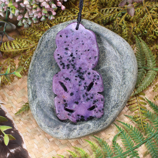 Hei Tiki carved from Russian Charoite