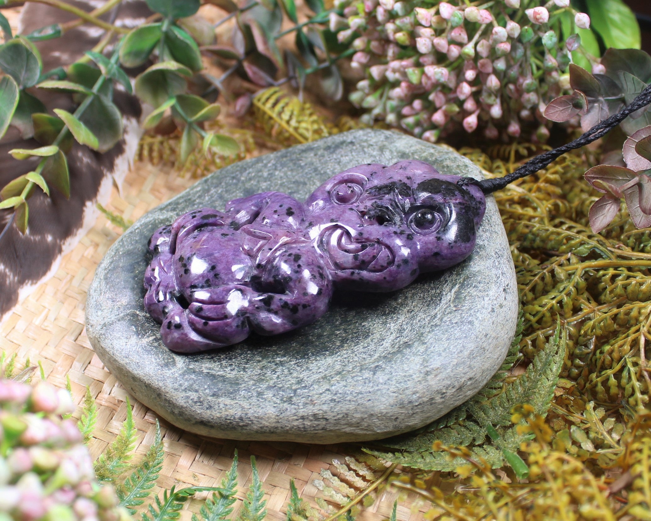 Hei Tiki carved from Russian Charoite