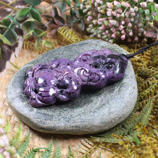 Hei Tiki carved from Russian Charoite