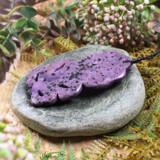 Hei Tiki carved from Russian Charoite